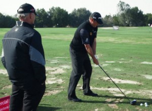Peter Cowan looks to get Lee Westwood sorted out after the World No. 1's first round 73