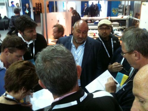 Chubby Candler in another media scrum (red)