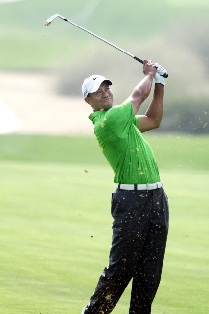 Tiger Woods - action shot 2011 Dubai Desert Classic