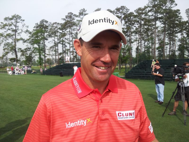 Padraig Harrington displaying his three sponsors for the next three events
