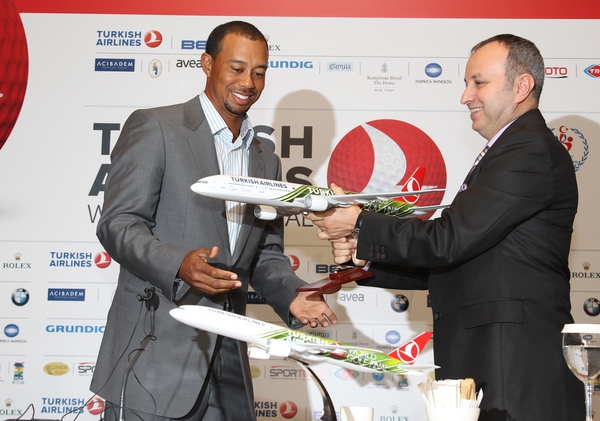 Tiger Woods presented with model airplane