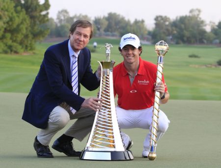 George O'Grady with McIlroy (red)