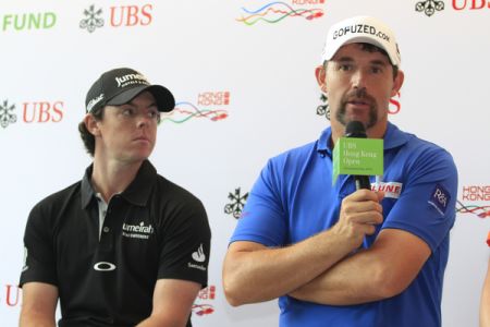 McIlroy looks at Harrington 2012 HK Open (red)