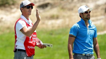 James Nittes and his caddy (red)