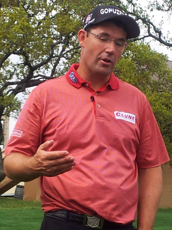 Padraig Harrington makinng a point alongside the 18th green at TPC San Antonio. (Photo - www.golfbytourmiss.com)