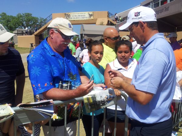 Padraig Harrington signs for fans after his third round in the Valero Texas Open. (Photo - www.golfbytourmiss.com)