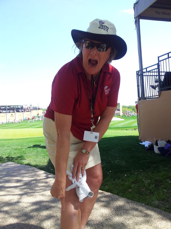 Lori McCutcheon points to her ankle where she was struck with Martin Larid's golf ball. (Photo - www.golfbytourmiss.com)