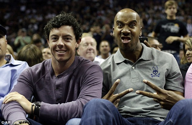 Rory McIlroy with San Antonio Spurs played Bruce Bowen during Sunday nigth's NBA game against the Miami Heat.