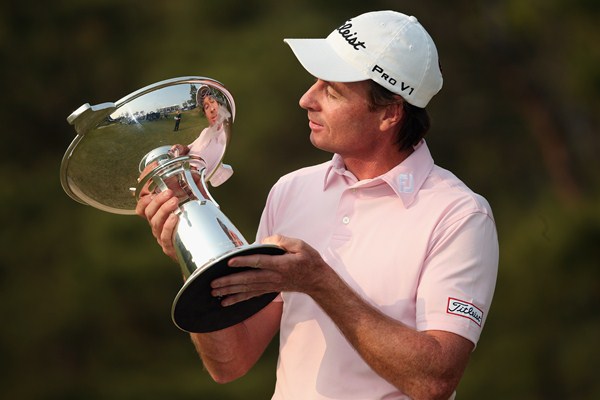 Rumford admires Ballantine's Championship trophy