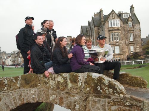 Michael Hoey's family on the Swilcan Bridge after his Dunhill Links triumph.
