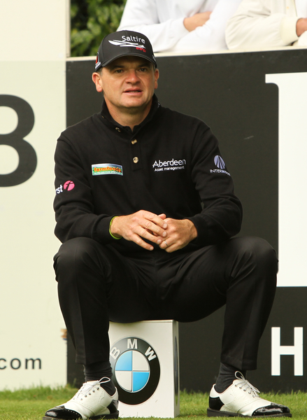 Scotland's Paul Lawrie selling his Ryder Cup winning clubs to Sir Alex Ferguson. (Photo - Fran Caffrey/www.golffile.ie)