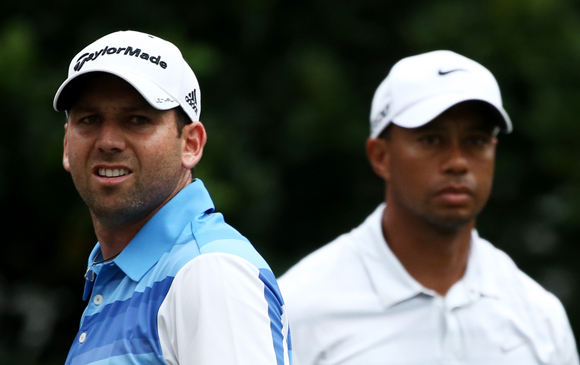 Tiger Woods urges everyone to 'move on' over Sergio Garcia affair.