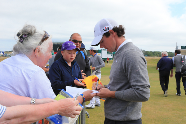 World No. 2 Rory McIlroy signs autographs for fans on the first day of official practice for the 142nd Open. (Photo - Fran Caffrey/www.golffile.ie)