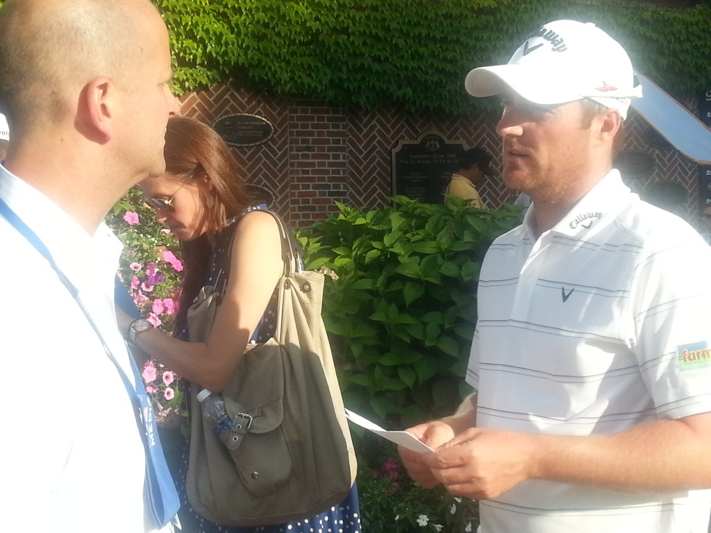 The PGA Tour's Mark Williams speaks with Marc Warren after his round about the likelihood of qualifying for the Wyndham Championship. (Photo - www.golfbytourmiss.com)