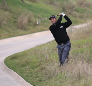 Harrington playing out of rough at the 8th hole but saying it's not big deal being outside top-100 on World Rankings.  (Photo - Eoin Clarke/www.golffile.ie)