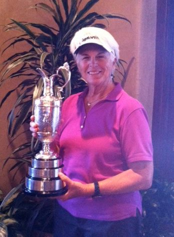 This woman found herself being photographed with the Claret Jug when Mickelson visited the Bridges Golf Club in Rancho Santa Fe.