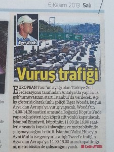 This Istanbul newspaper predicting choas as Tiger Woods hits balls off Bosphorus Bridge.