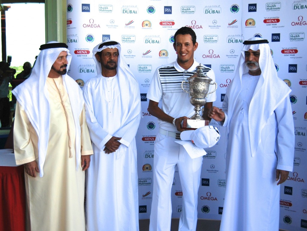 England's Lee Corfield presented with the trophy in capturing the 2013 MENA Tour championship title. (Photo - www.menatour.com)