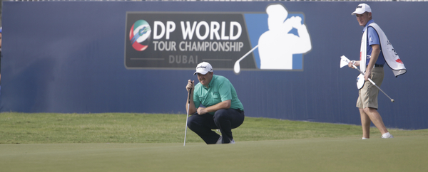 Shane Lowry down on his haunches a day after joking he brought a camel to its knees, (Photo - Denise Cleary/www.golffile.ie)