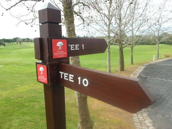 Oceanico Millennium course tee box direction post.