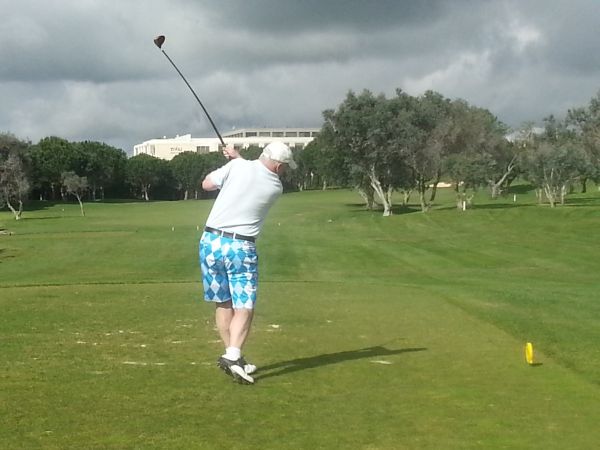 Joe Duddy in his Royal and Awesome shorts gets play underway on day 2 at Oceanico Millennium.