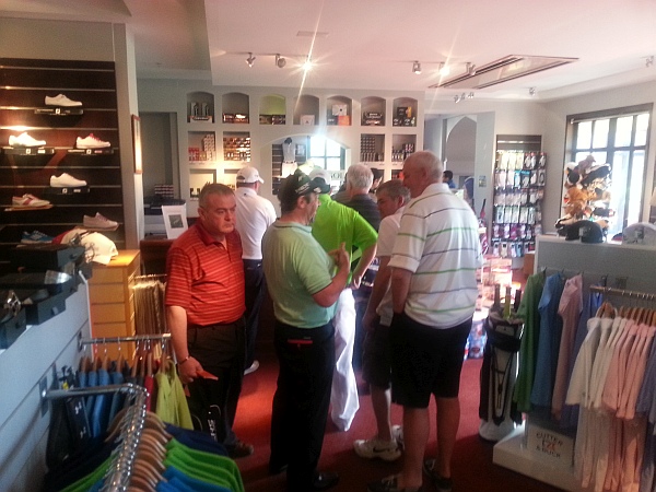 The guys gather in the pro shop at Vila Sol