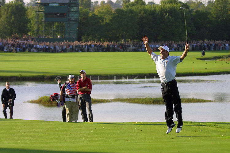 Jim Furyk can do nothing as Paul McGinley holes a 12-foot putt to hand Europe victory in the 2002 Ryder Cup.