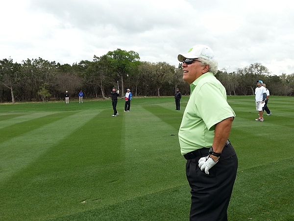 Speedy Gonzalez watches Martin Laird play his shot into final green - 2014 Valero Tezas Open Pro Am.