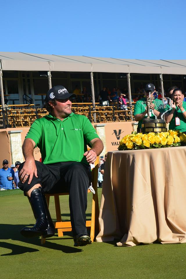 Steven Bowditch tries on his size 12 Texas Cowboy boots. (Photo - www.golfbytourmiss.com)