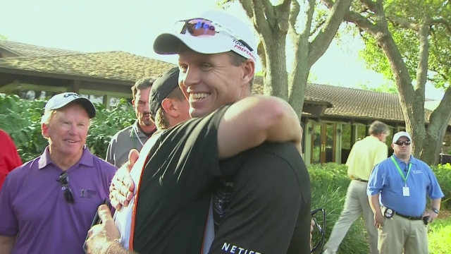 Bernie looks on as John Senden is congratulated by his caddy. (Photo - www.pgatour.com)