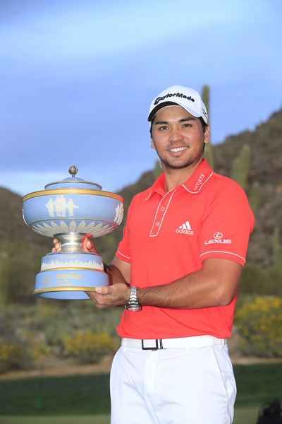 Jason Day in happier times and with both thumbs wrapped around the Accenture Match-Play championship trophy. (Fran Caffrey www.golffile.ie)