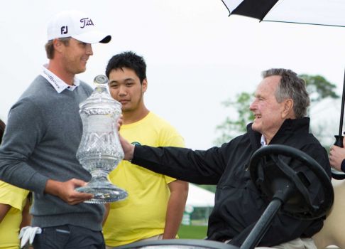 Matt Jones handed the Shell Houston Open trophy by former US President George Bush.