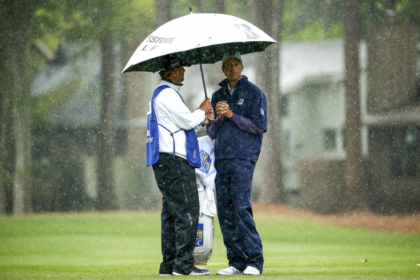 Matt Kuchar, and Graeme McDowell's likely rival at this year's Ryder Cup, shelters from the rain during the second round of the RBC Heritage Classic. (Photo - www.pgatour.com)