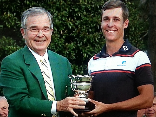 Augusta Chairman Billy Payne presents Oliver Goss with the Low Amateur award and the first-ever Australian to win the award.