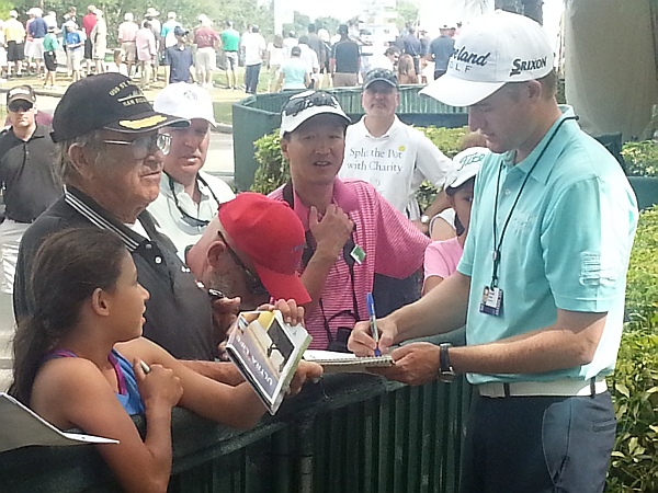 Russell Knox sure to be signing autographs for his Scottish fan base after confirmation of an invitation to contest July's Scottish Open.  (Photo - www.golfbytourmiss.com)
