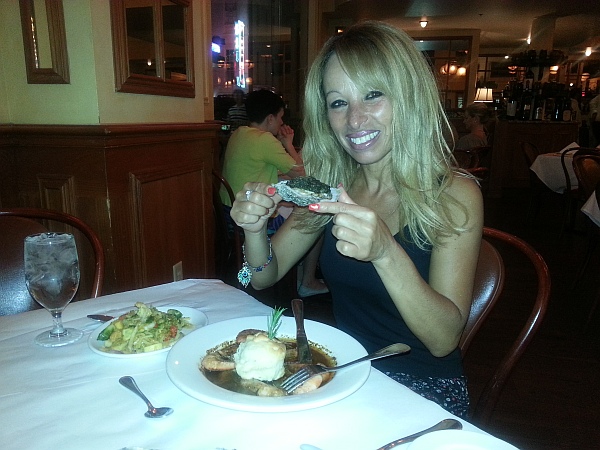 Tour Miss about to savour one of the famed New Orleans oysters.