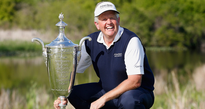 Colin Montgomerie wins his first Major - 2014 PGA Seniors Championship in Michigan.