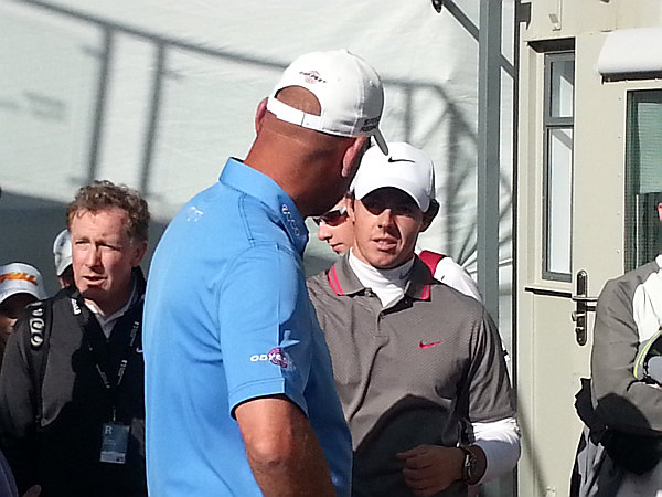 Dane Thomas Bjorn congratulates Rory McIlroy on his 2014 BMW PGA Championship win. (Photo - www.golfbytourmiss.com)