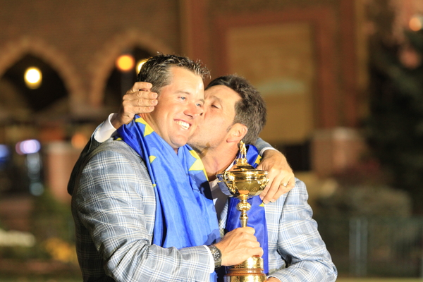 Victorious European Captain Jose Maria Olazabal plants a kiss on England's Lee Westwood after winning 2012 Ryder Cup. (Photo - Colum Watts/www.golffile.ie)