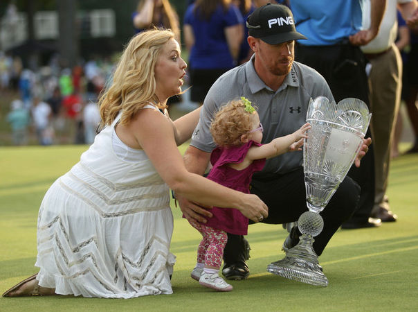 A warning of events that would unfold a few minutes later as Hunter Mahan knocks over the Barclays Championship trophy. A short while later the crystal trophy will be in two pieces.