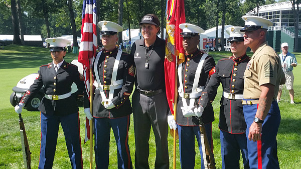 Phil Mickelson wears his 'dog tags' for a photo shoot with US Marines.