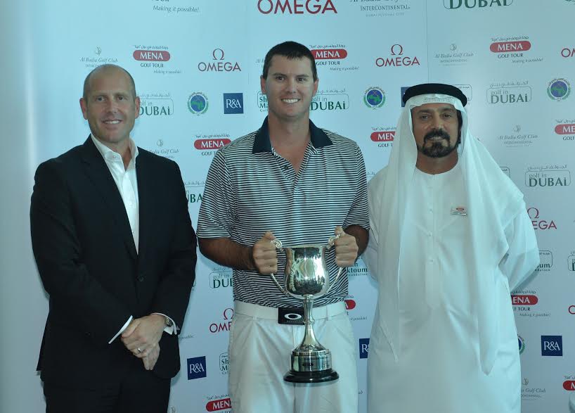 Shaikh Maktoum Dubai Open winner Cyril Suk with Mohamed Juma Buamaim, chairman of the MENA Golf Tour, and James Shippey, golf club manager at Al Badia Golf Club. (Photo - www.MENA Tour.com)