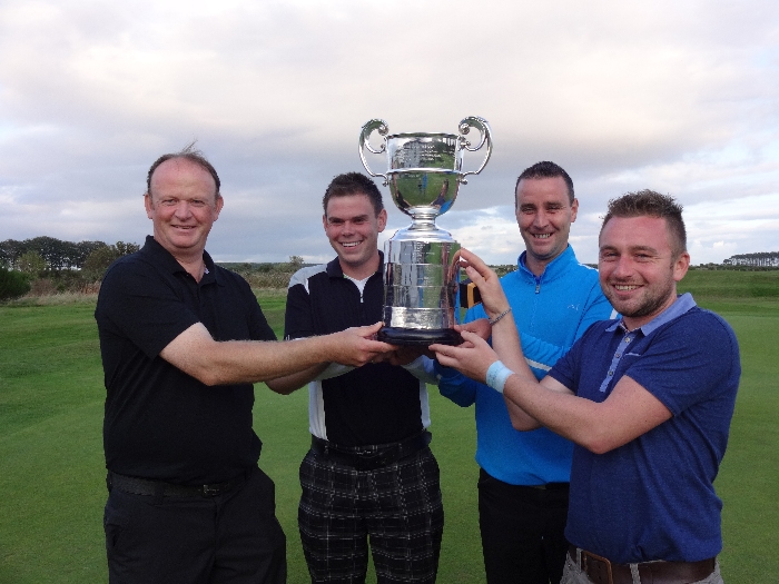 Fortrose and Rosemarkie Golf Club (Secretary Mike MacDonald in blue top) celebrate their 2014 Northern Counties Championship success.