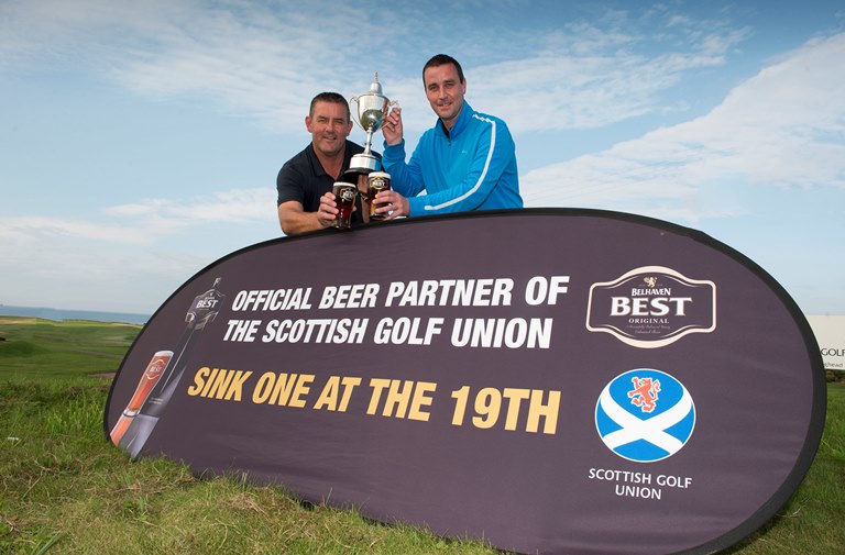 Fortrose and Rosemarkie's Mika MacDonald (right) and Match and Handicap Secretary John Jack celebrate their victory on the Craighead Links course at Crail.