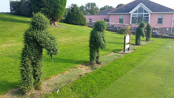 There's a guard of honour to greet you stepping onto the first tee.