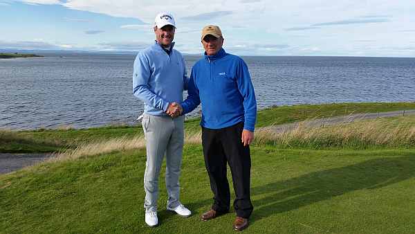 Marc Warren meets with by respected Crail Golfing Society member Rab Redpath on the 18th tee at Balcomie Links.