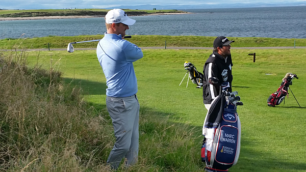 Marc Warren chipping from rough to left of the 17th green.