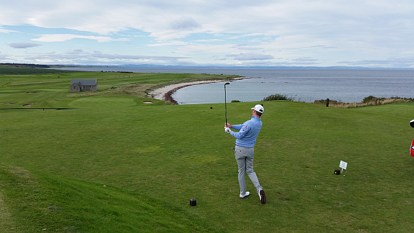 Marc Warren hitting off the par three, 14th hole.