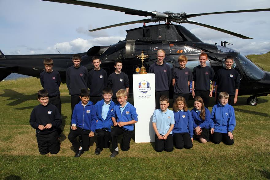 Local Isle of Harris school children welcome the arrival of the Ryder Cup.