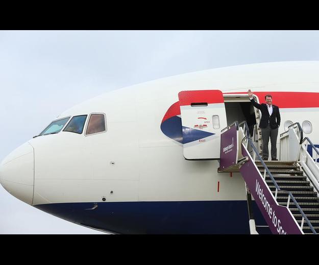 Tom Watson first off the special USA Ryder Cup team charter flight.